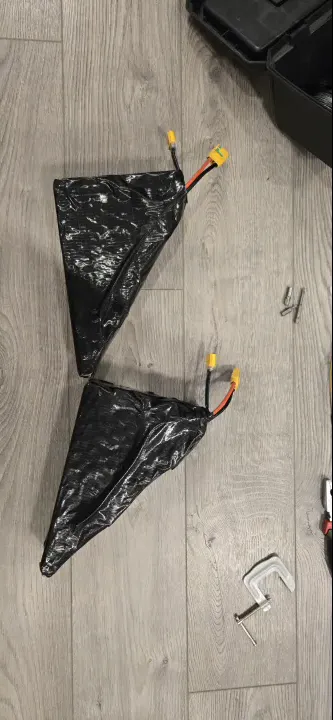 Both 6S battery packs on the floor before assembly