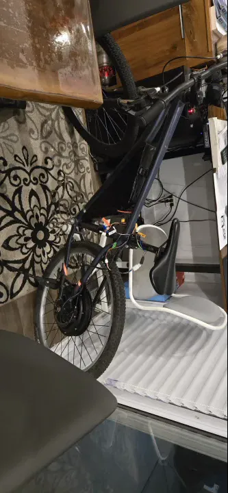 Full bike with hub motor wired to VESC, battery placed, 3D printed mount attached