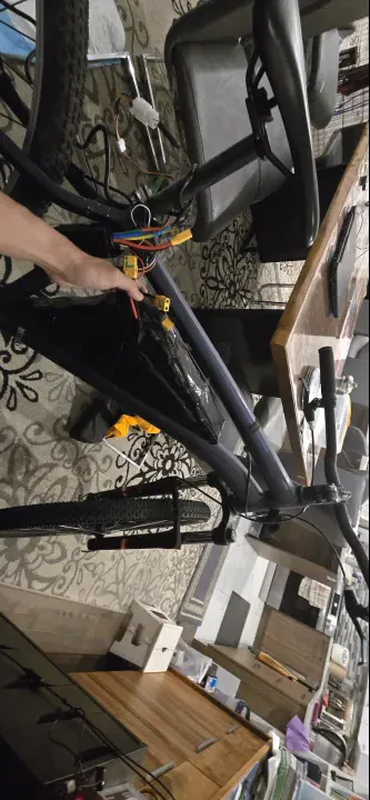 Both packs taped together on the bike frame for a test fit