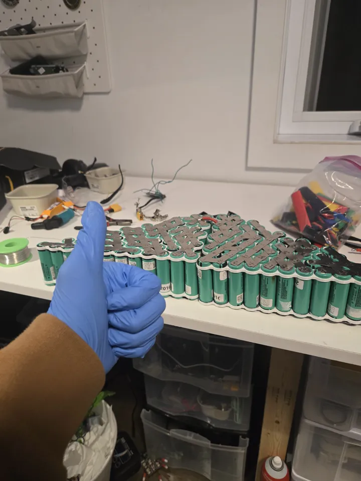Wearing gloves when careful — thin enough to feel the metal while soldering balance leads on a 72V pack