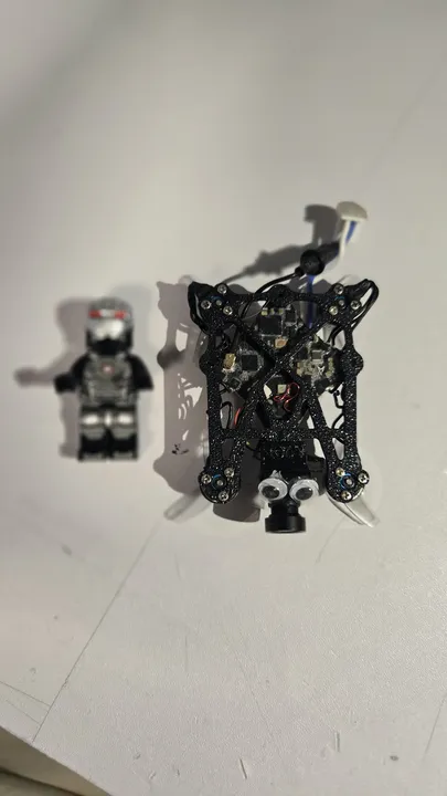 Drone beside a LEGO minifigure for scale